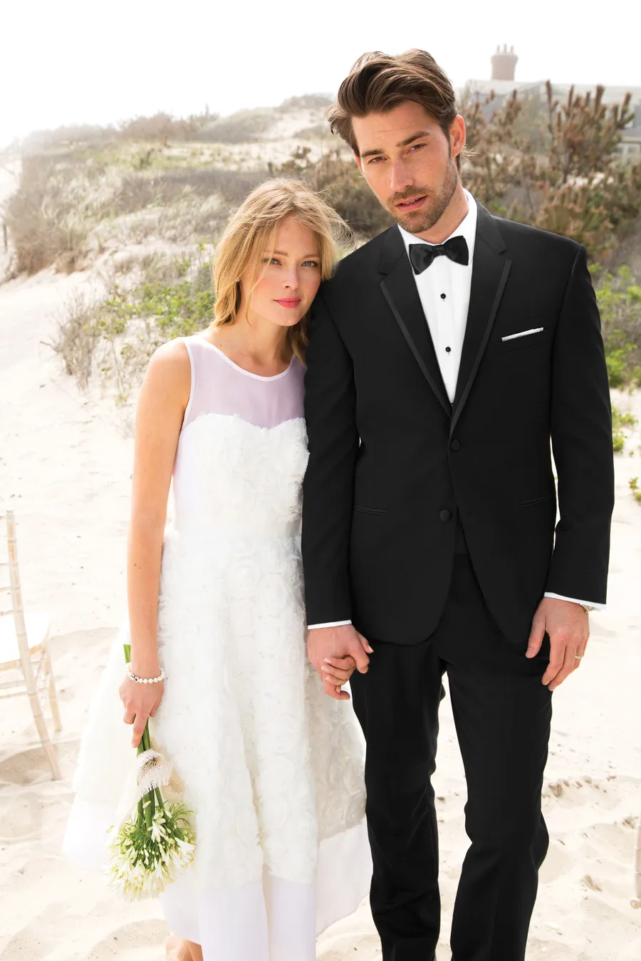 Michael Kors black tuxedo at a beach wedding