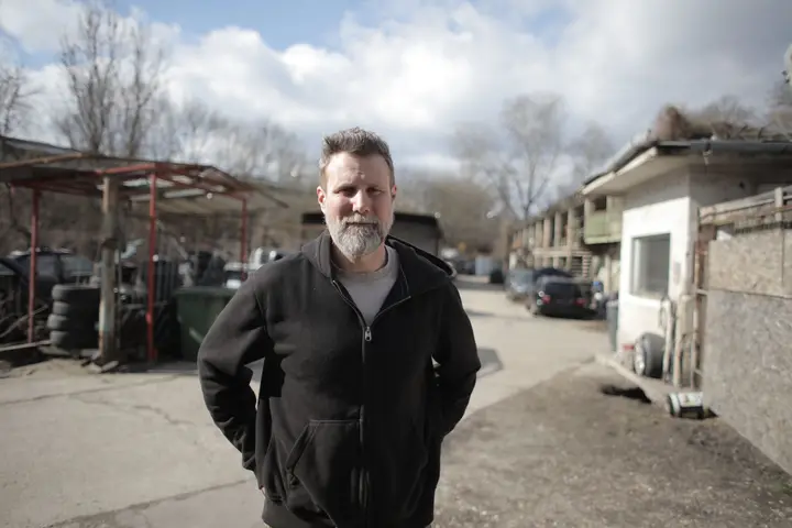 Auto repair owner at work